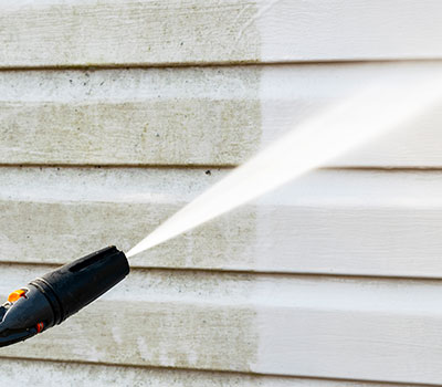 How Soft Washing Your Home Saves You Money While Making It Look Amazing